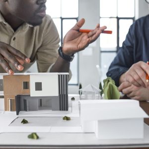 Architect working with construction of building Architect working with construction of building
