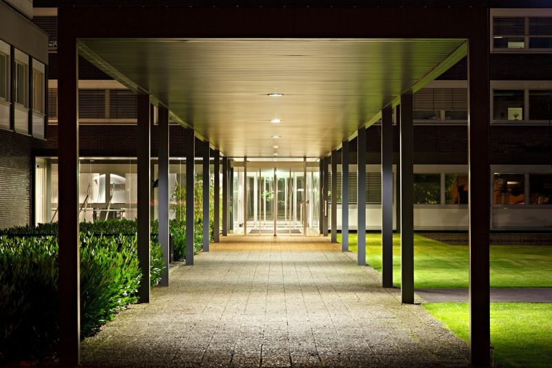 Roofed Office Building Entrance At Night